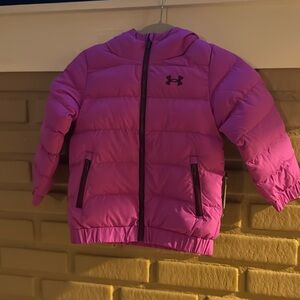 Girl under Armour coat
